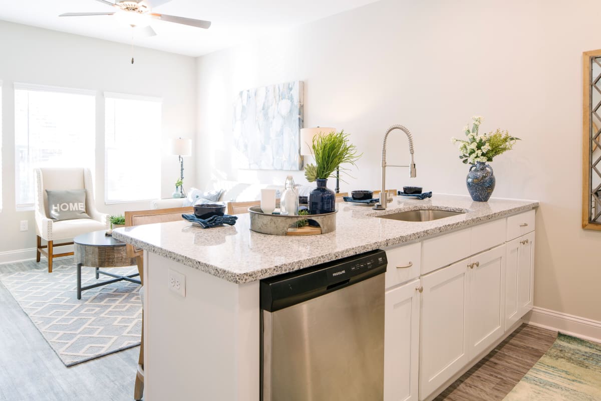 Gorgeous kitchen with white cabinetry at The Grove at Ardsley Park in Savannah, Georgia