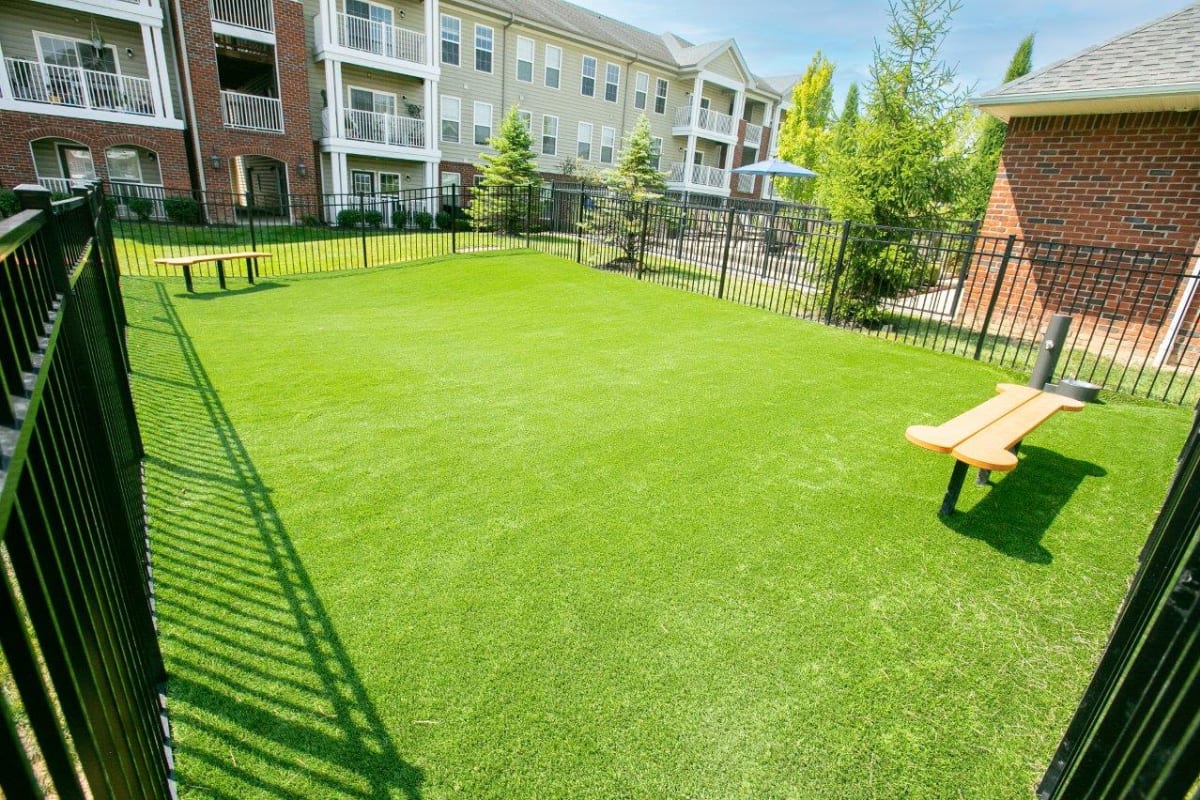 Dog park with benches at Clifton Park Apartment Homes in New Albany, Ohio