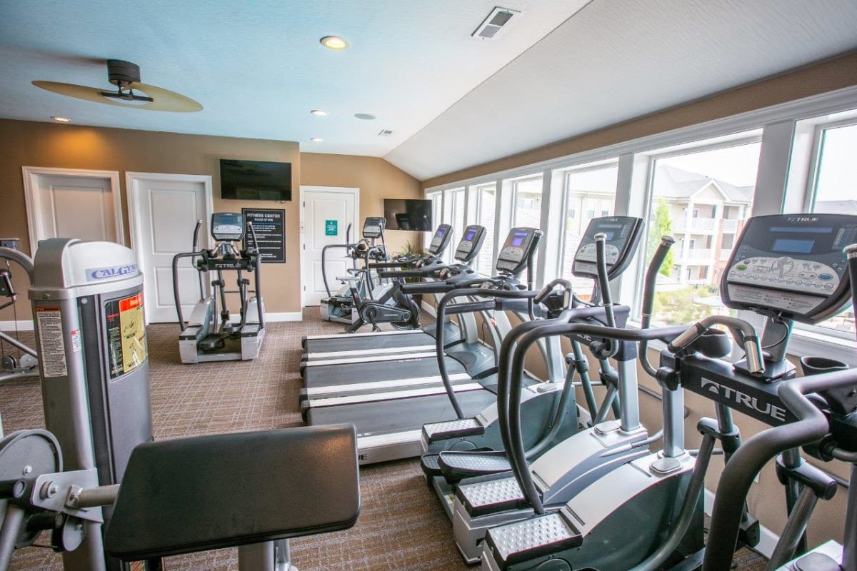 Fitness center cardio equipment at Clifton Park Apartment Homes in New Albany, Ohio