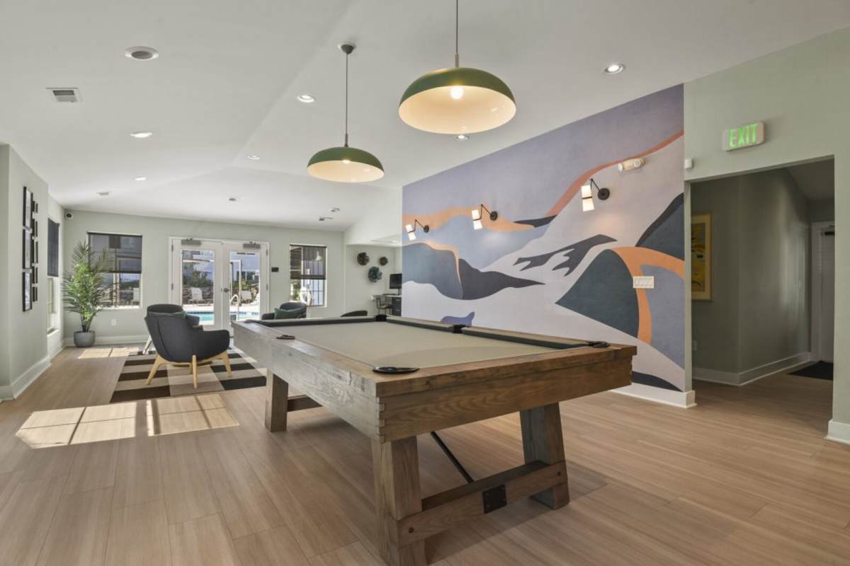 Renovated clubhouse with shuffleboard at Walker Landing in Aurora, Colorado