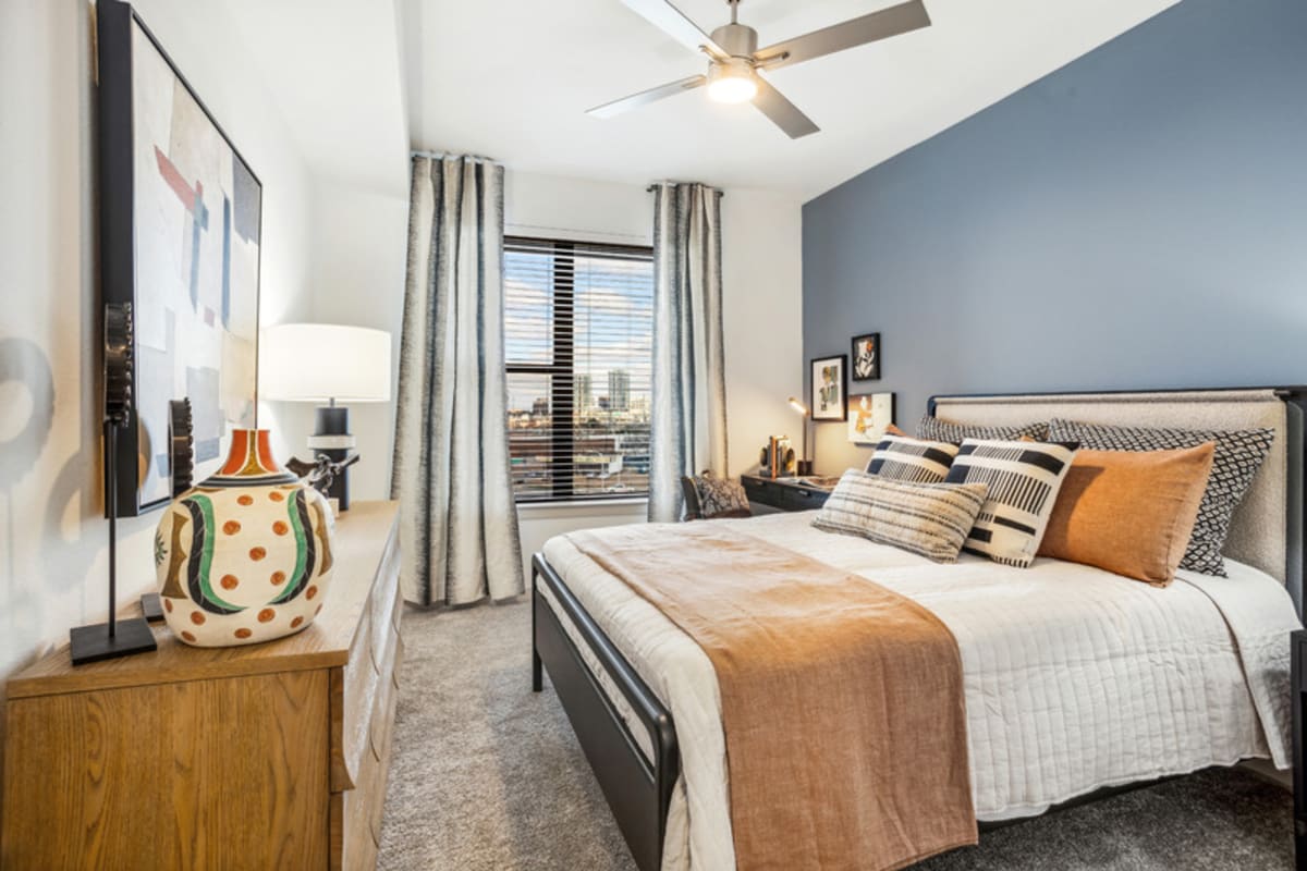 Relaxing bedroom space at The Margaret at Riverfront in Dallas, Texas