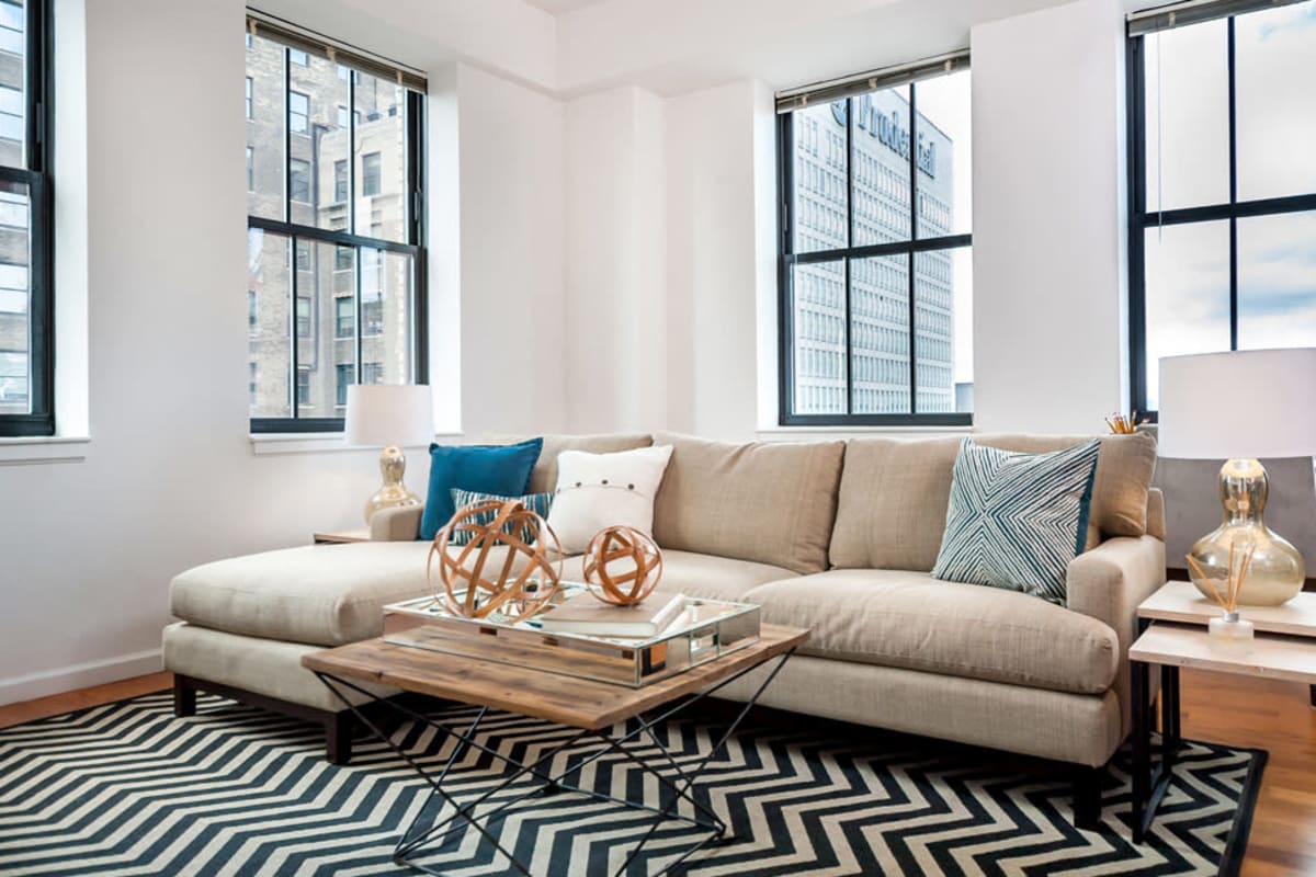 Wood-style flooring in an apartment living room at Eleven80 in Newark, New Jersey