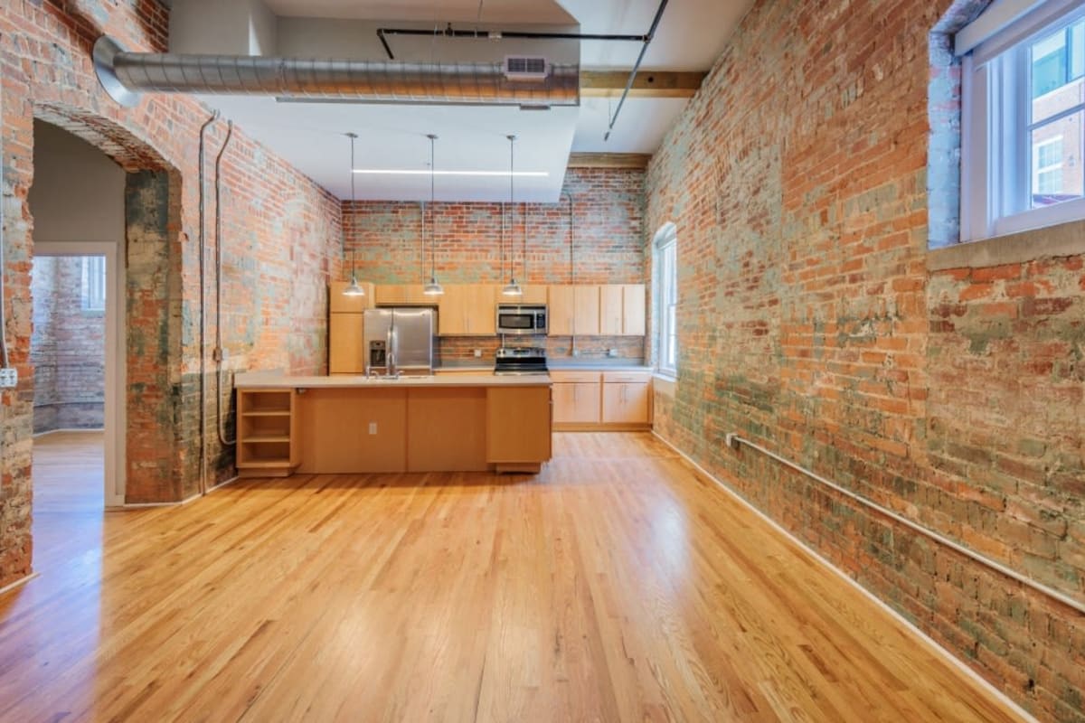 Spacious apartment with expose brick at Mill 800 in Winston-Salem, North Carolina