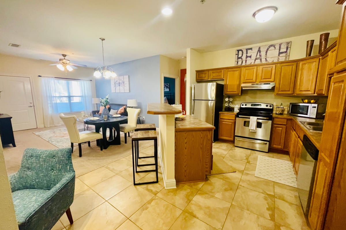 Kitchen and dining area at Oceanaire Apartments in Biloxi, Mississippi