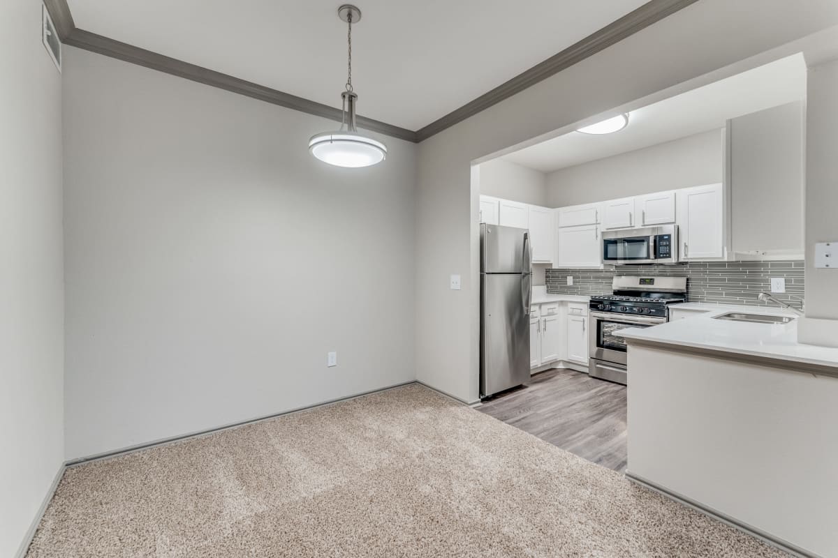 Apartment living room and kitchen at Parkside Crossing in Austin, Texas