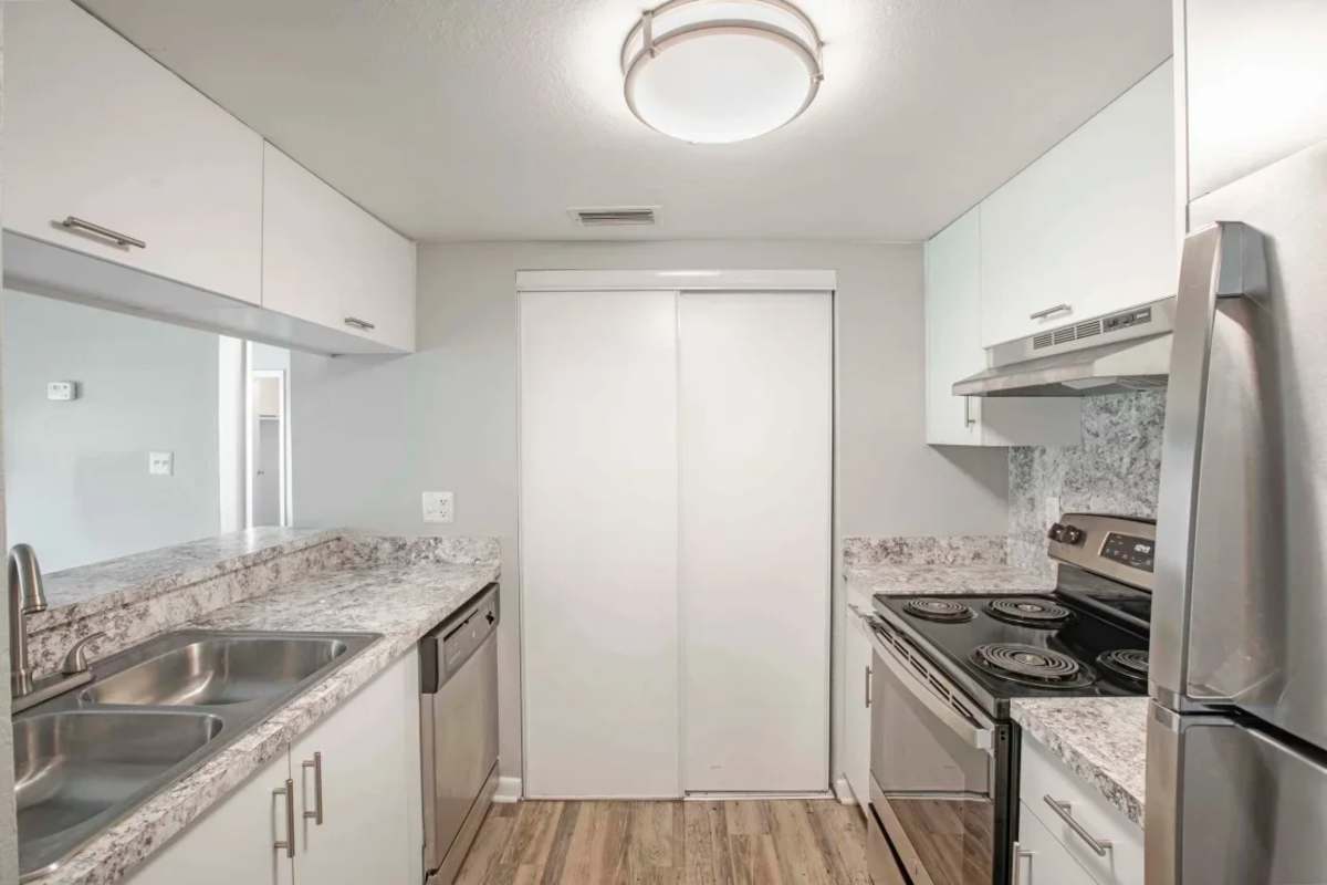 Stainless-steel appliances in a kitchen at Mirador at Woodside in Kissimmee, Florida