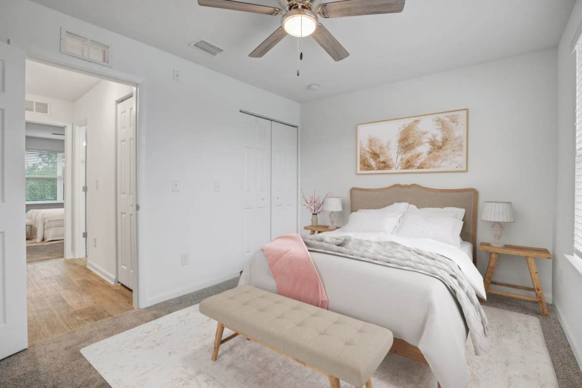 Bedroom with a ceiling fan at The Marley at Trout River in Jacksonville, Florida