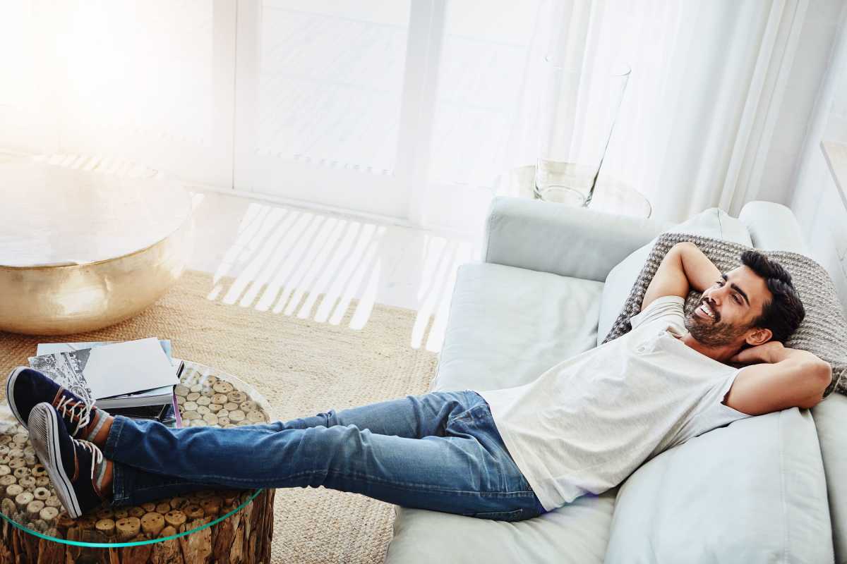 Resident relaxing in his home at The Madison Ames in Ames, Iowa