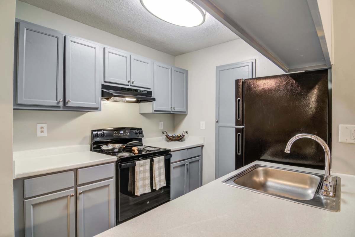 Kitchen at Flats At Riverview in Duluth, Georgia