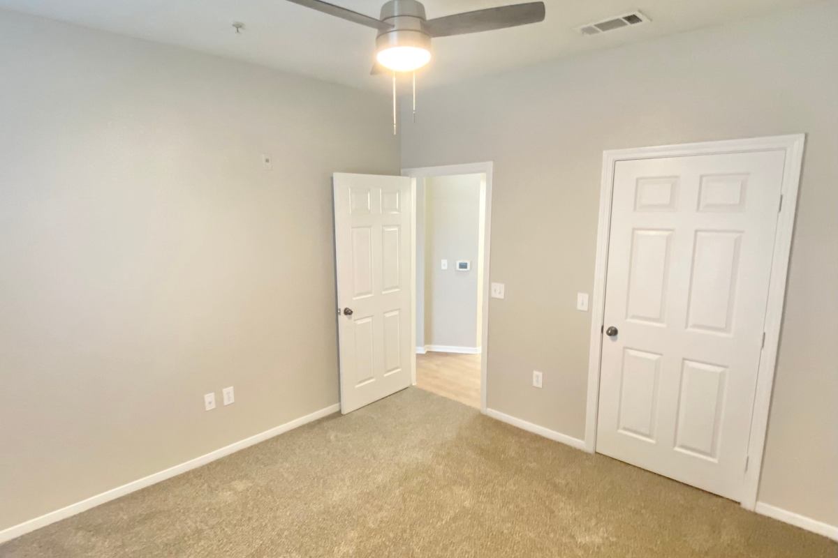 An apartment bedroom at Vistas of Vance Jackson Apartments in San Antonio, Texas