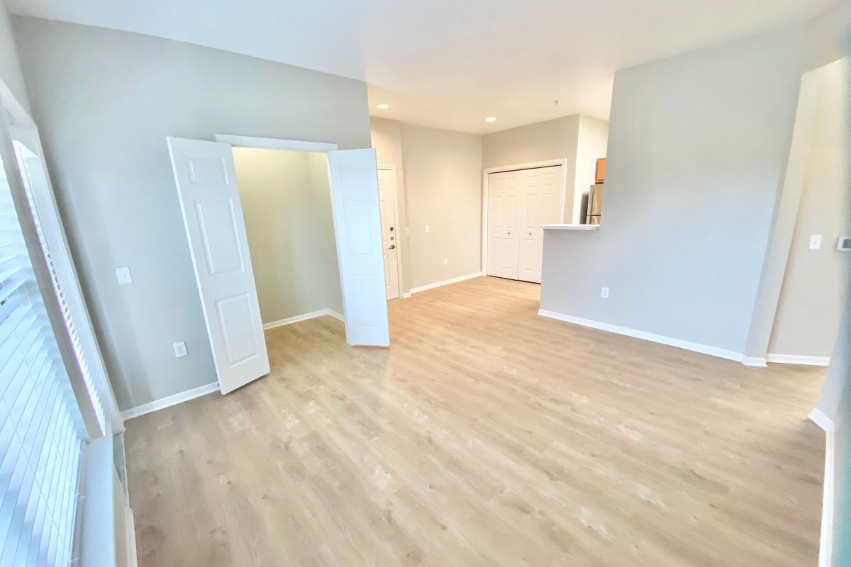 Wood-style flooring in an apartment at Vistas of Vance Jackson Apartments in San Antonio, Texas