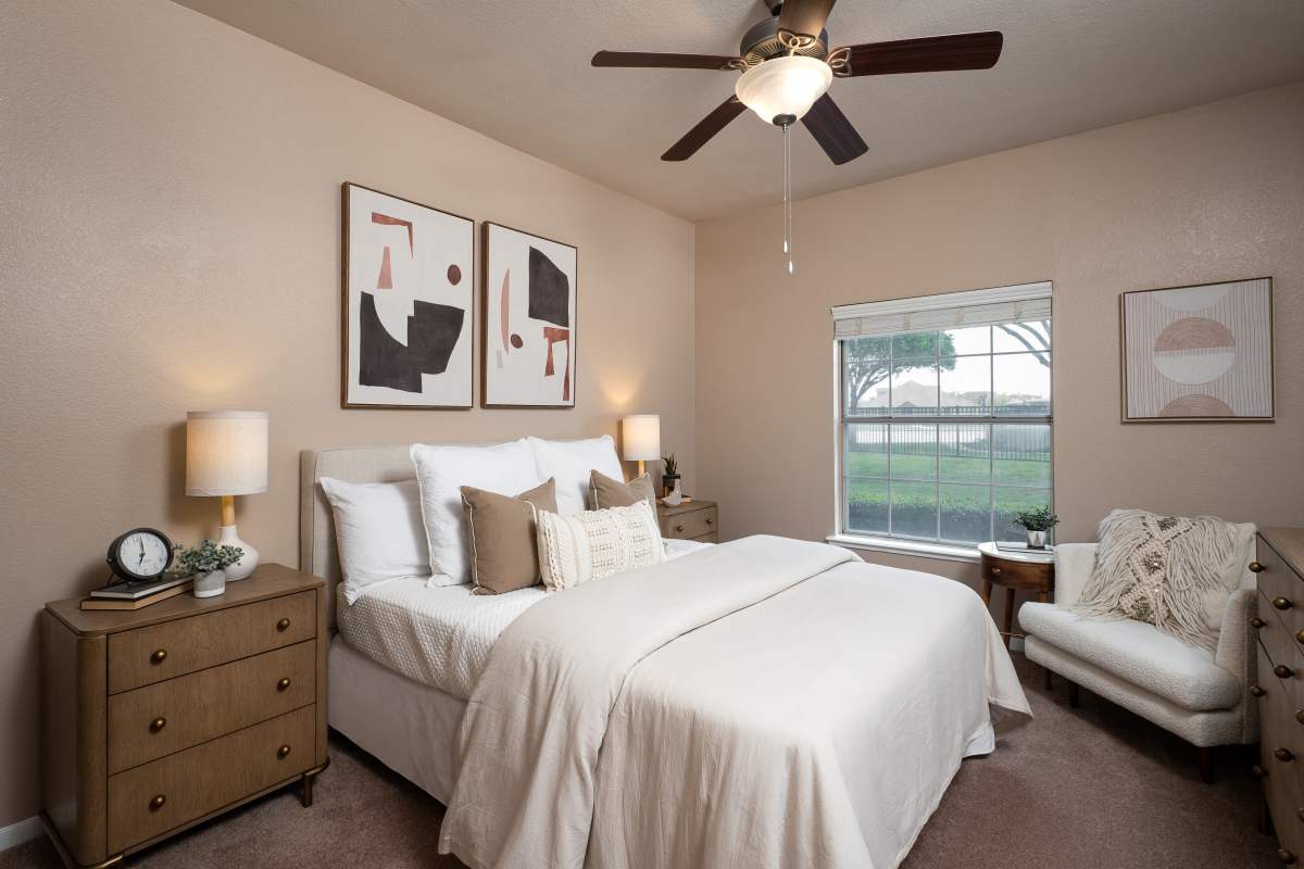 Bedroom with ceiling fan at Crescent Cove at Lakepointe in Crescent Cove at Lakepointe, Texas