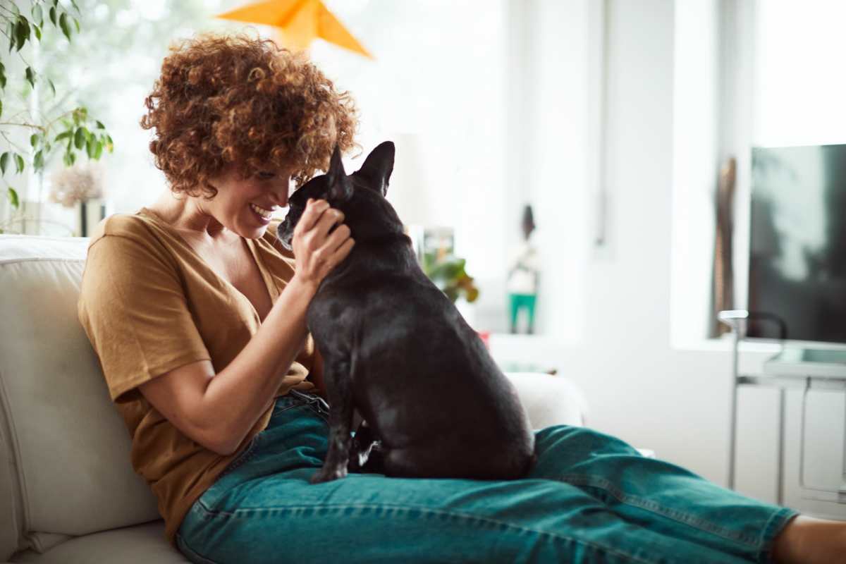Resident and her dog in a pet-friendly apartment at Morado Bothell in Bothell, Washington