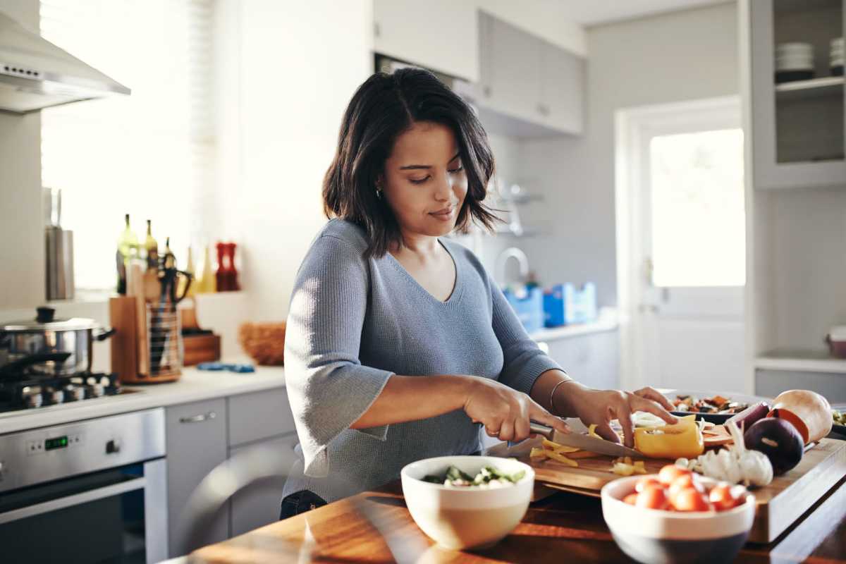 Resident chopping food at Morado Bothell in Bothell, Washington