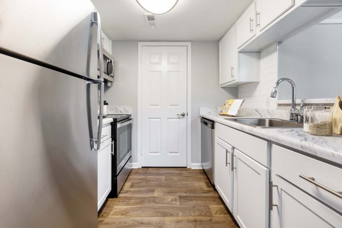 Kitchen with stainless-steel appliances at Reserve at Providence in Charlotte, North Carolina
