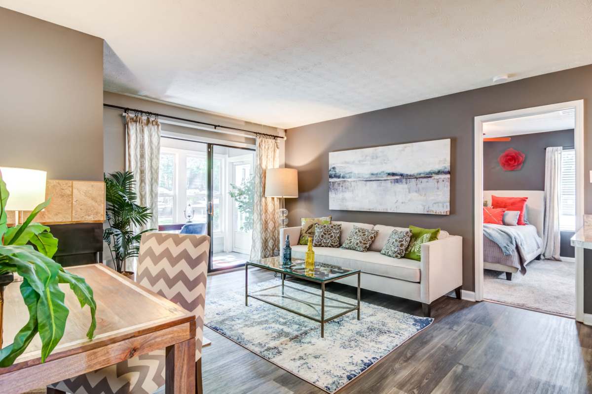 Wood-style flooring in an apartment living room at 2200 Big Creek Apartments in Roswell, Georgia