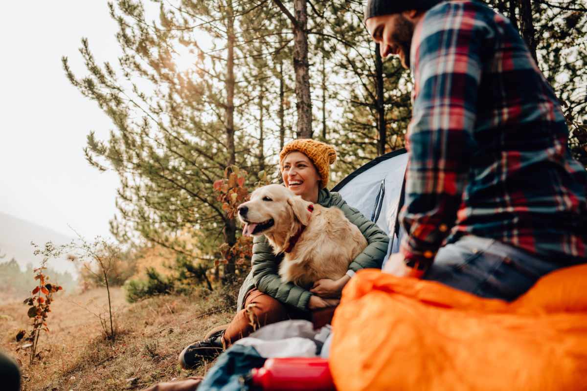 Couple and their dog out on a camping trip at a very cool spot near BB Living at The Oaks in Meridian, Idaho
