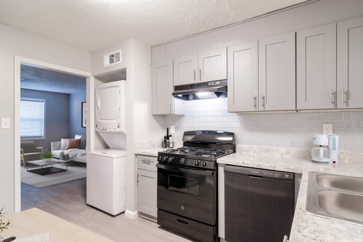 Kitchen with a washer and dryer at Westwood Glen in Atlanta, Georgia