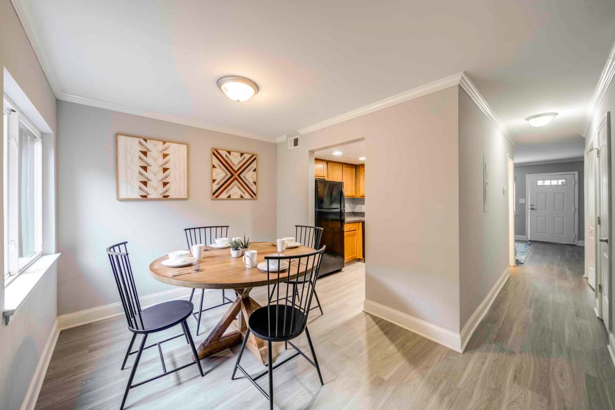 Dining room and kitchen at The Trails of North Hills in Raleigh, North Carolina