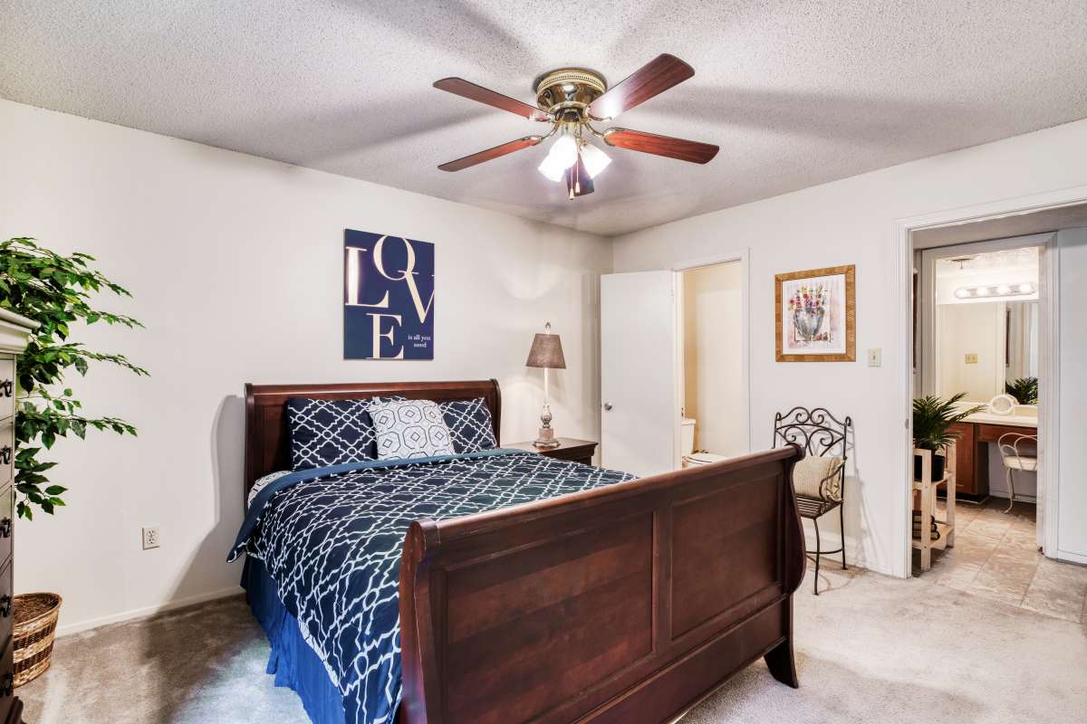Model bedroom with ceiling fan at Sycamore Lake in Memphis, Tennessee