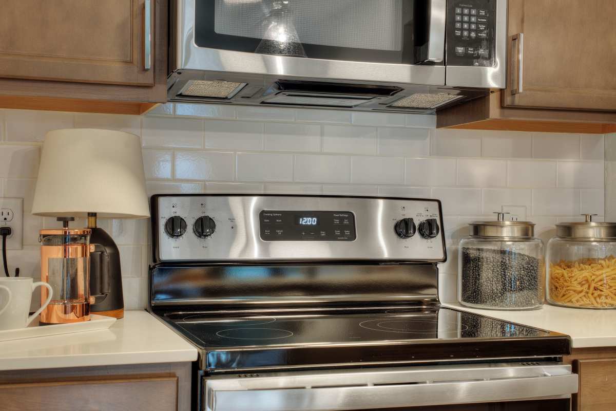Kitchens with stainless-steel appliances at Alder Walk in Puyallup, Washington