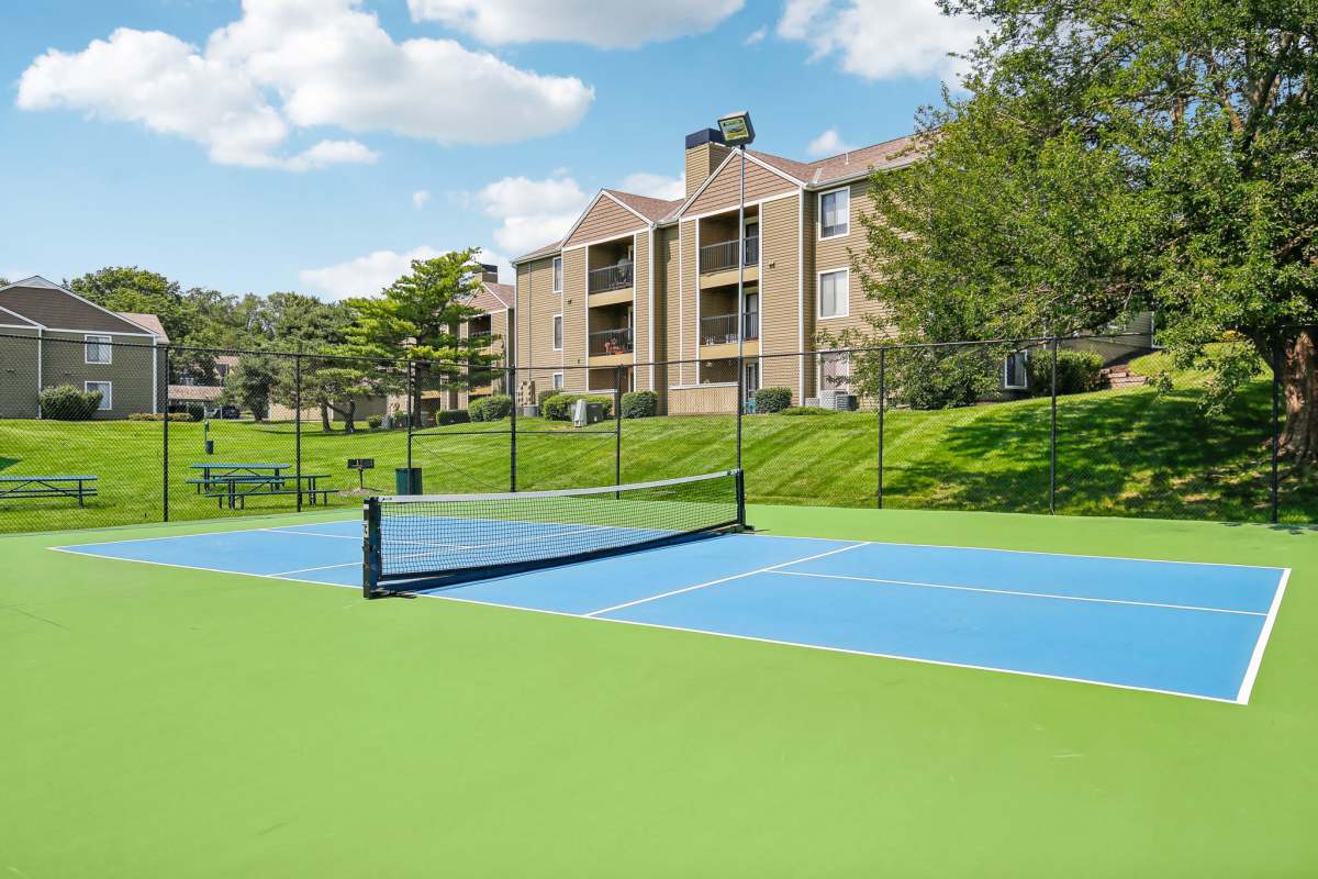 On-site tennis courts at Aspen Lodge in Overland Park, Kansas