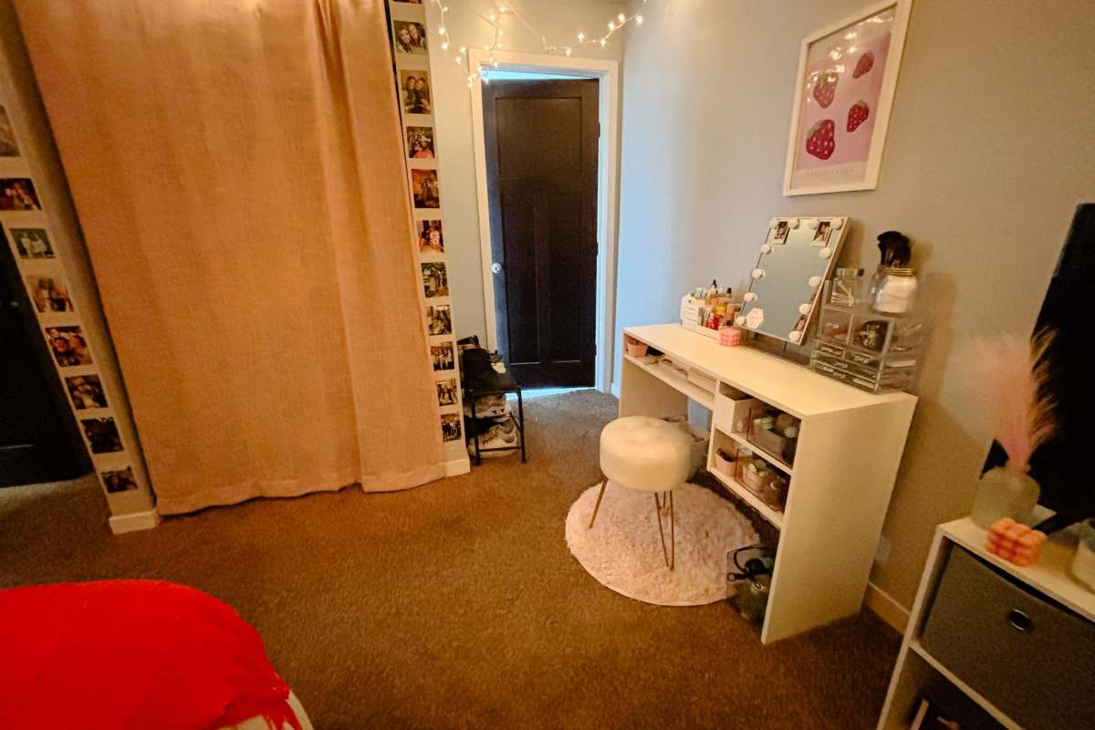 Bedroom with closet and desk at Lofts @ 1633 in Mankato, Minnesota