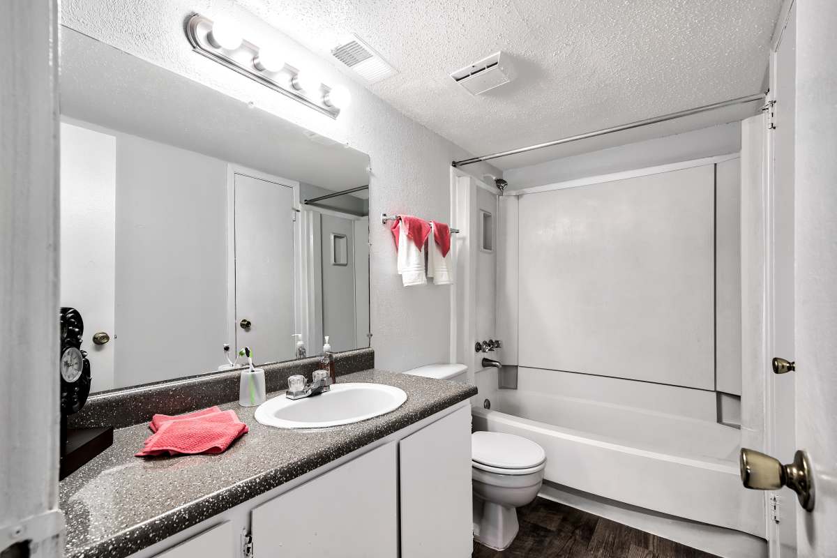 Resident bathroom with great lighting at Sherwood Acres in Baton Rouge, Louisiana