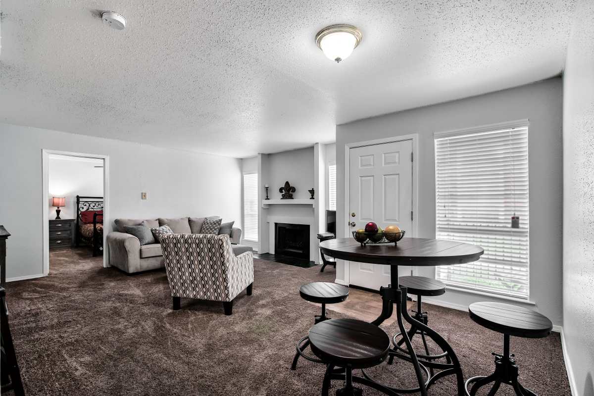 Resident living space with a fireplace at Sherwood Acres in Baton Rouge, Louisiana