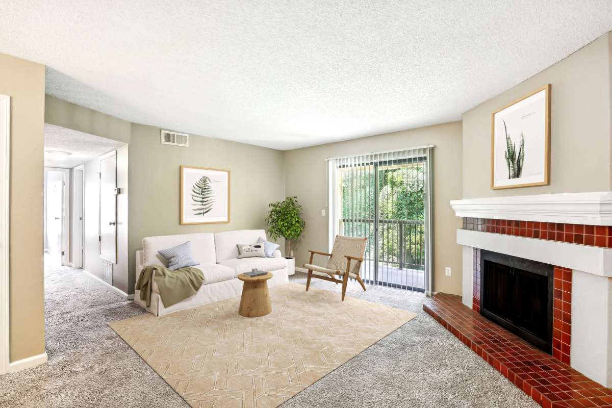 Resident living space with a fireplace at Casa De Fuentes in Overland Park, Kansas