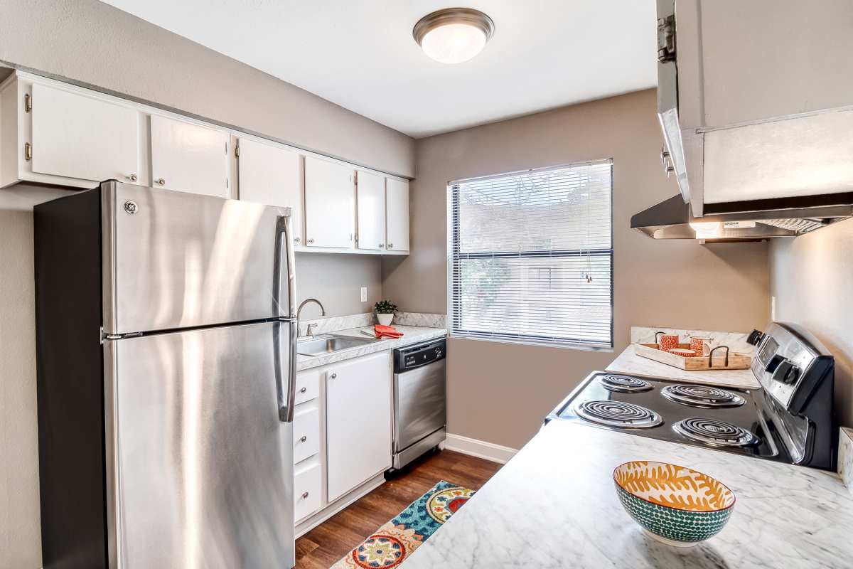 Modern kitchen with updated appliances at Cypress Pointe in Louisville, Kentucky