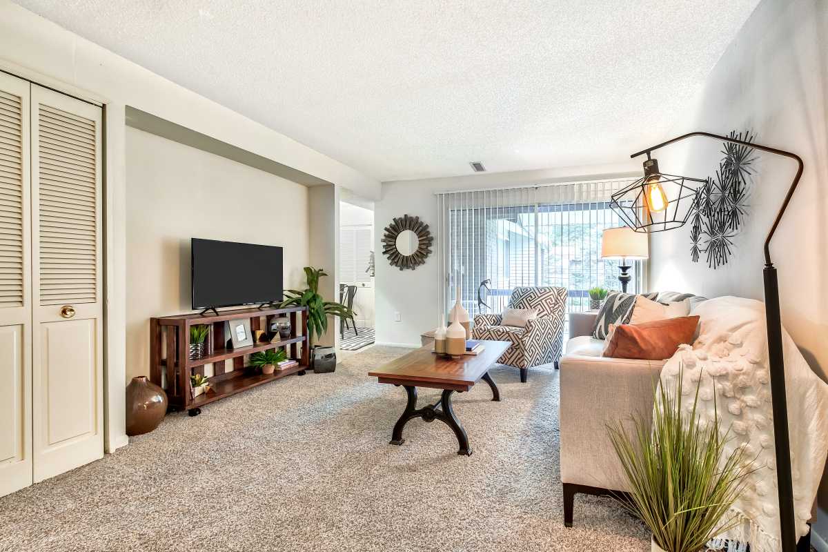 Resident living space with plush carpeting at The Pines in Harrisburg, Pennsylvania