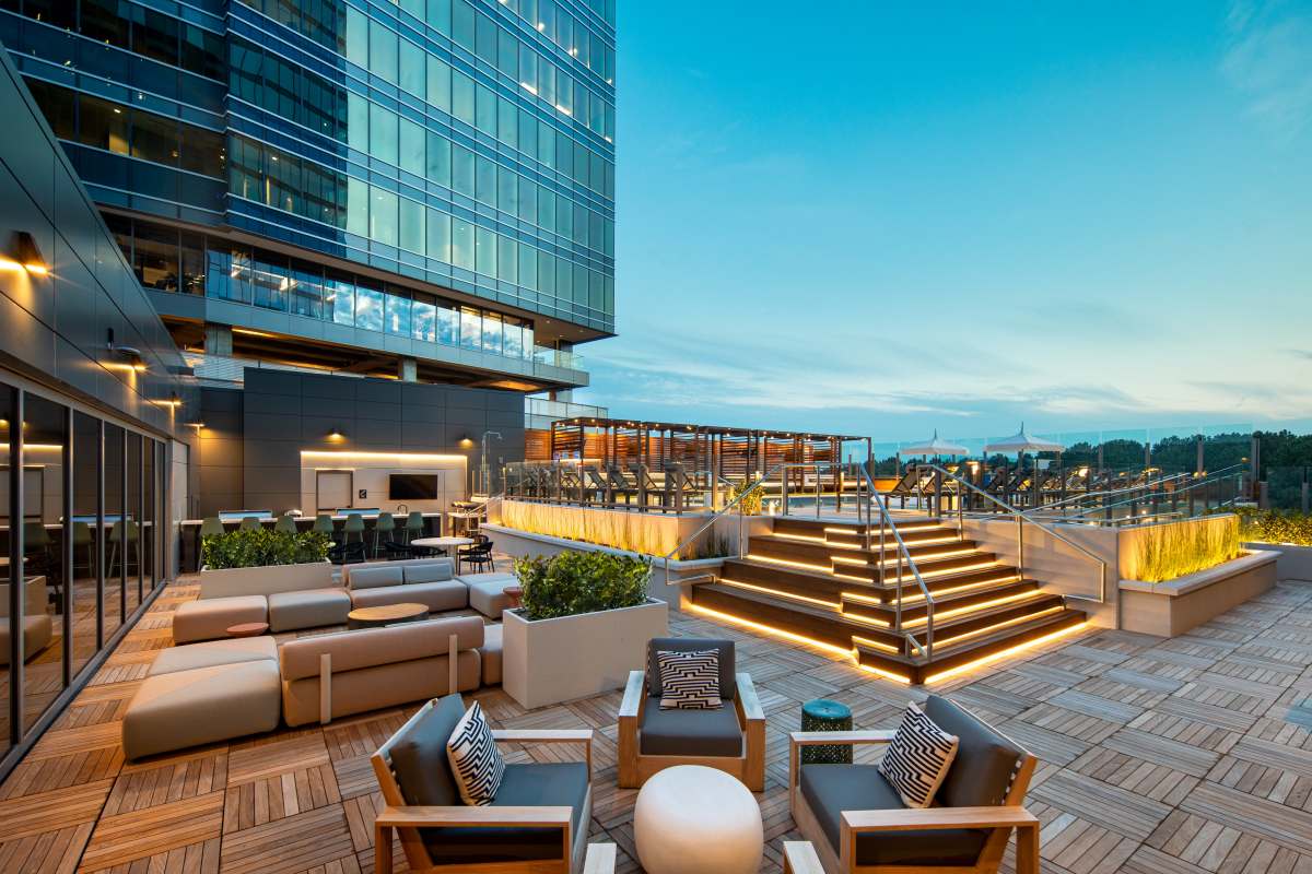 Outdoor lounge area by the pool at The Eastern in Raleigh, North Carolina