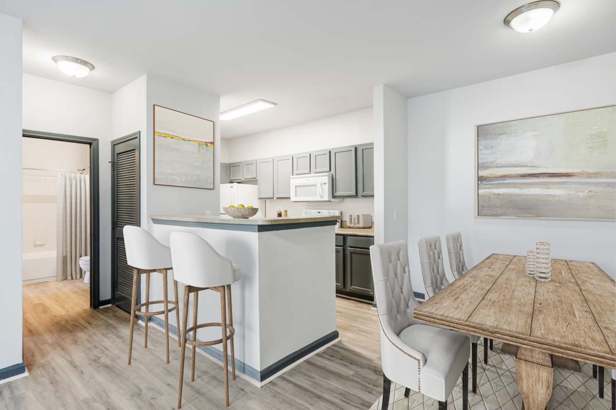 View of dining room and kitchen at Parc At Metro Center in Nashville Tennessee