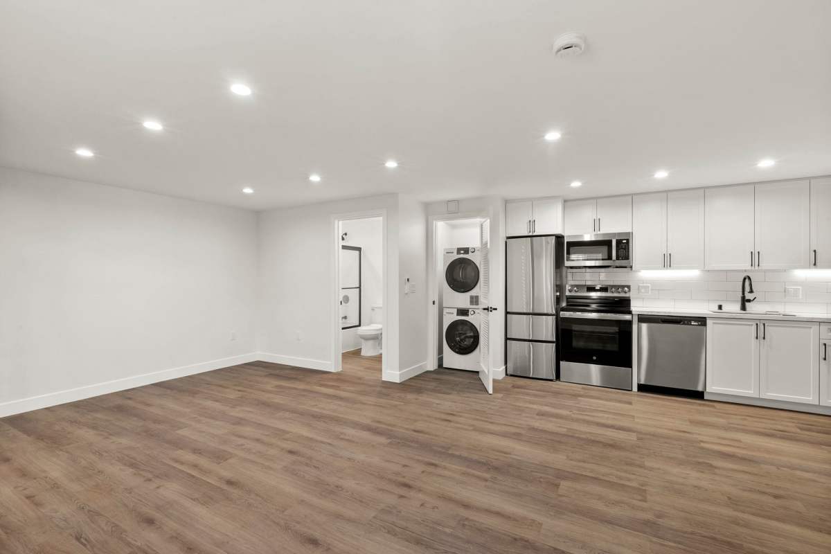 Kitchen with all electric appliances at Los Feliz Village in Los Angeles, California