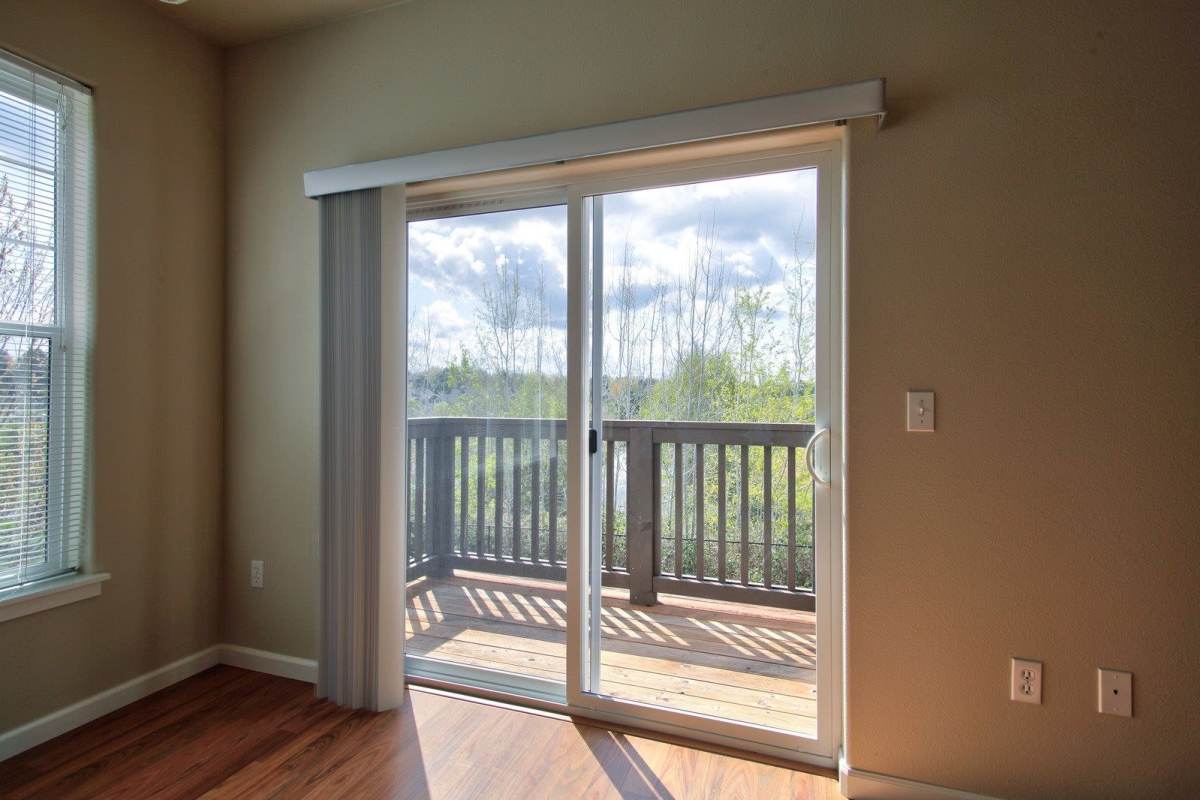 Patio access from living room at Sunset Crossing in Beaverton, Oregon,