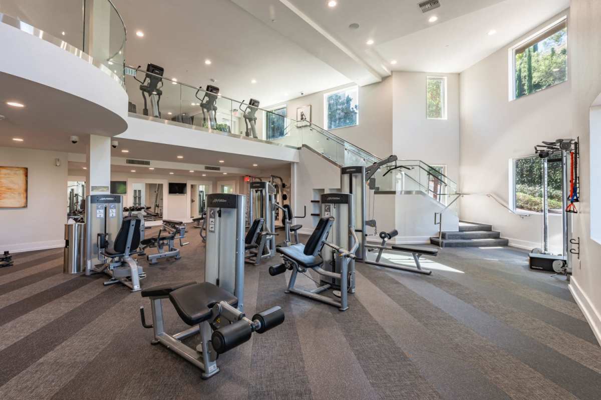 Fitness center with two floor gym at The Boulevard Apartment Homes in Woodland Hills, California
