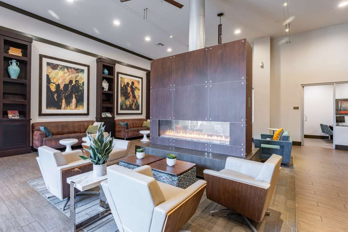 Clubhouse with fireplace at The Boulevard Apartment Homes in Woodland Hills, California