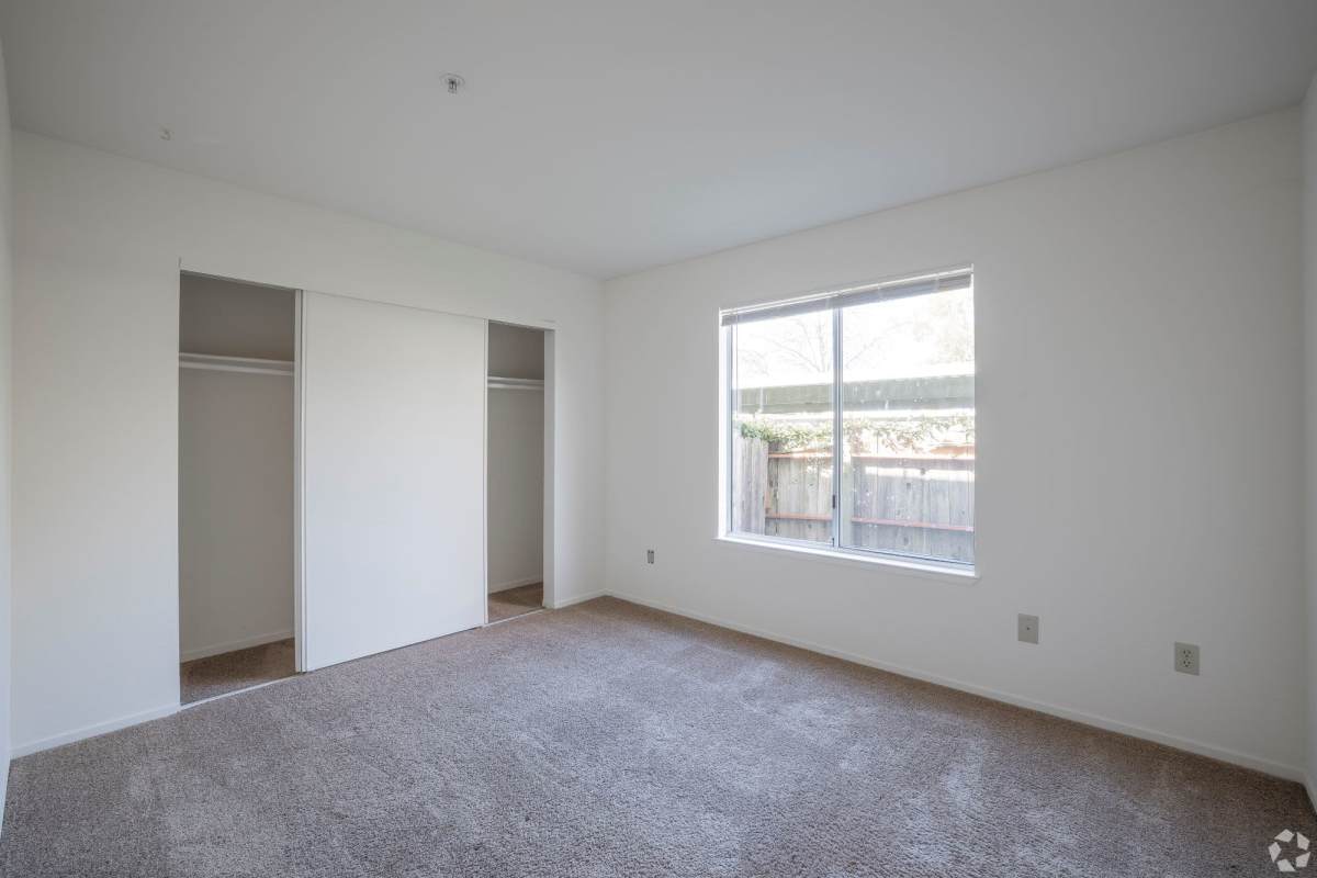 Bedroom with large window at Cadillac Flats in Napa, California