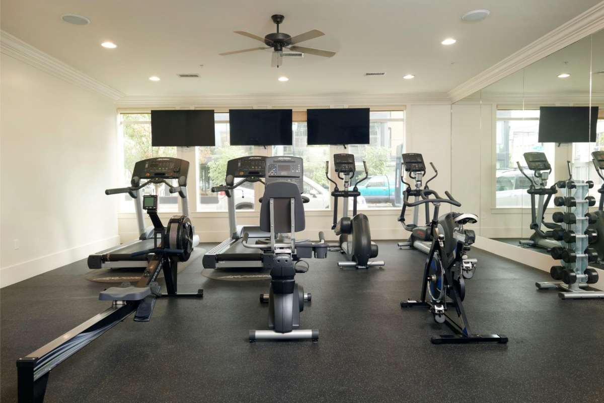 Fitness center with television and treadmill at Sugar Flats in Salt Lake City, Utah