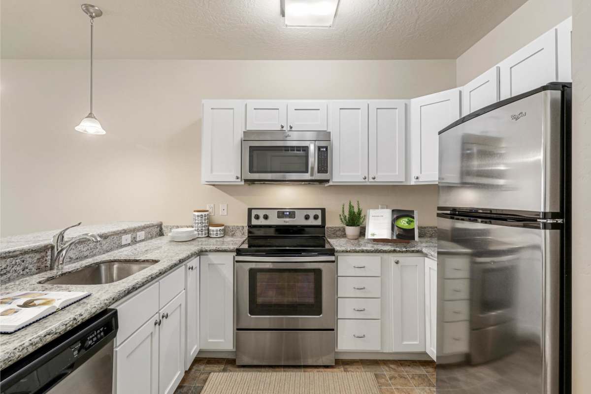Kitchen with granite countertop at Sugar Flats in Salt Lake City, Utah