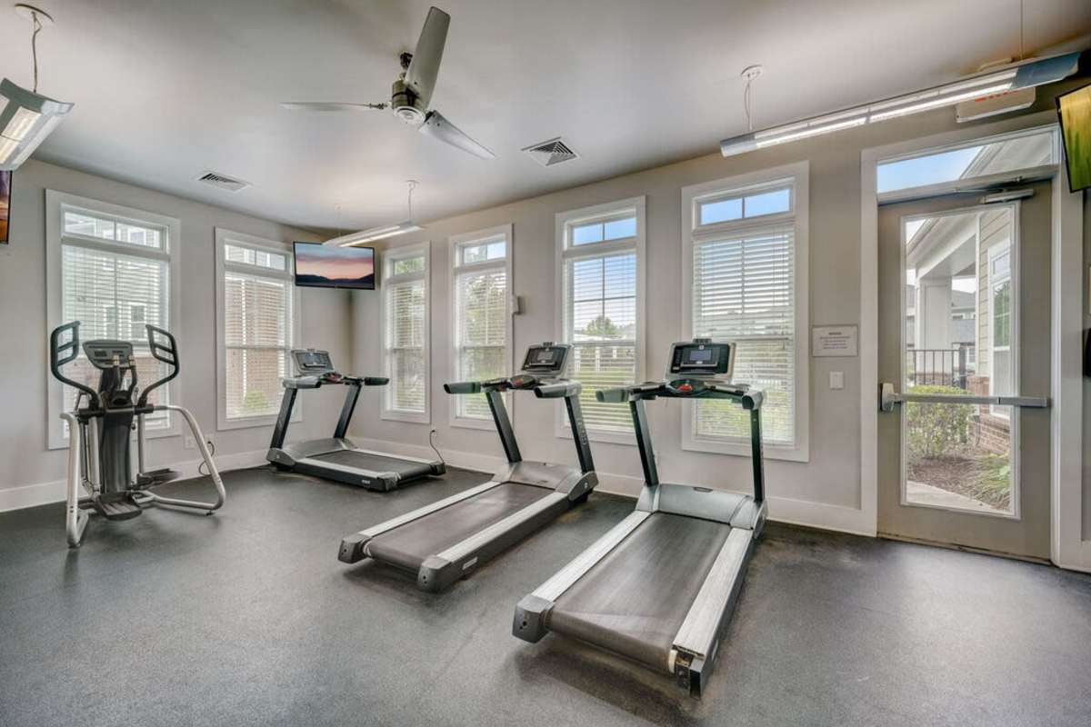 Fitness center featuring modern equipment and a spacious workout area at Century Park Place in Morrisville, North Carolina