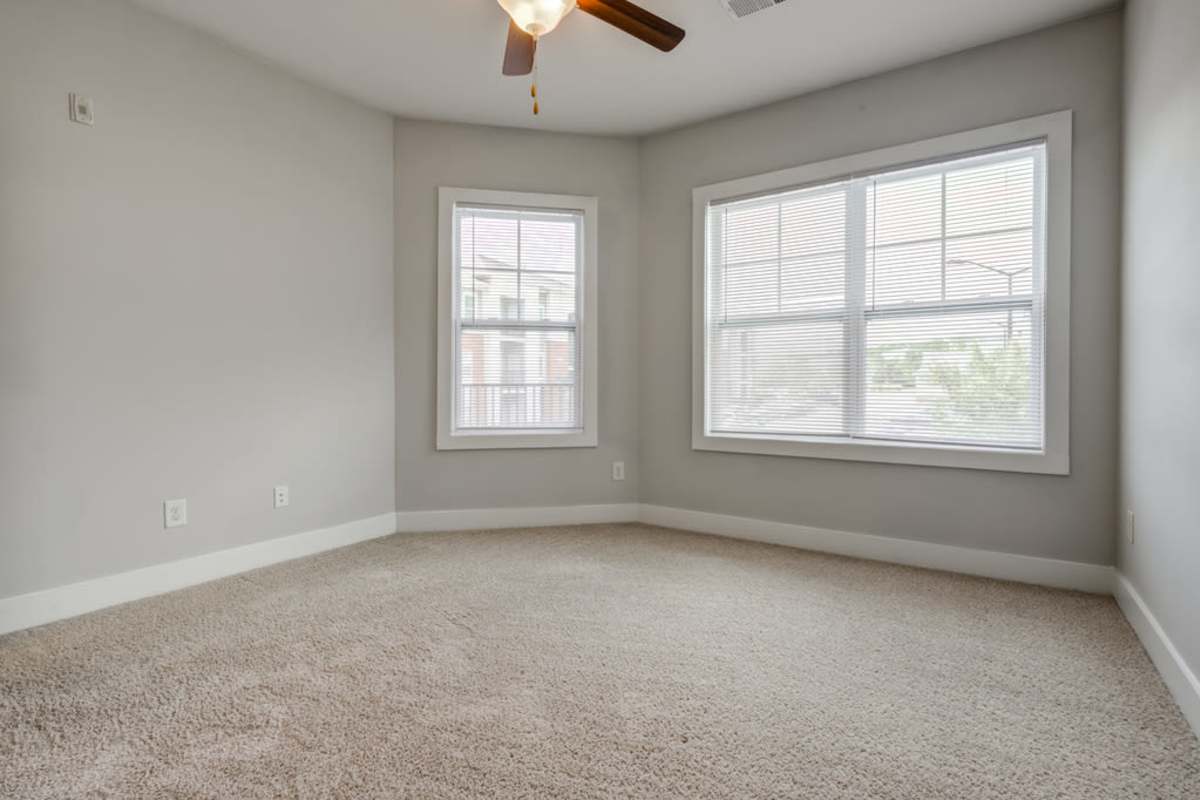 An empty room with windows at Century Park Place in Morrisville, North Carolina