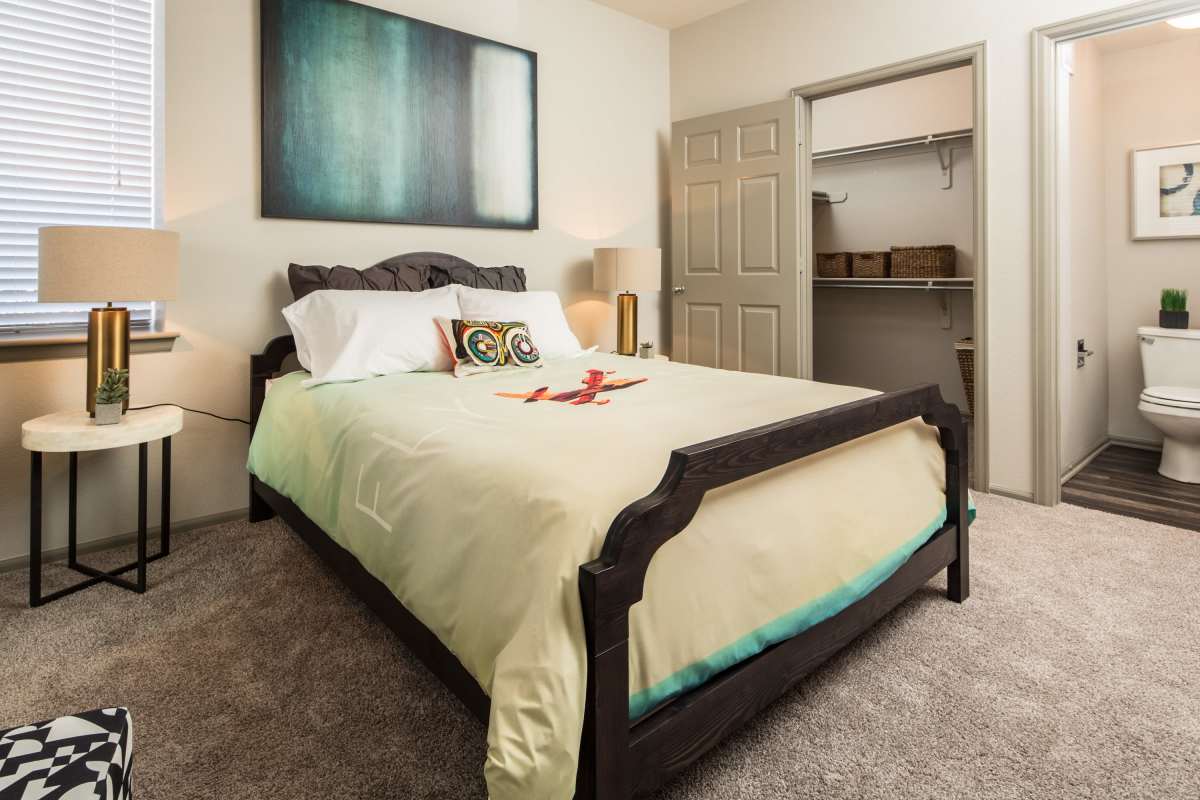Spacious bedroom with large bed at Lafayette Station in Lafayette, Colorado, 