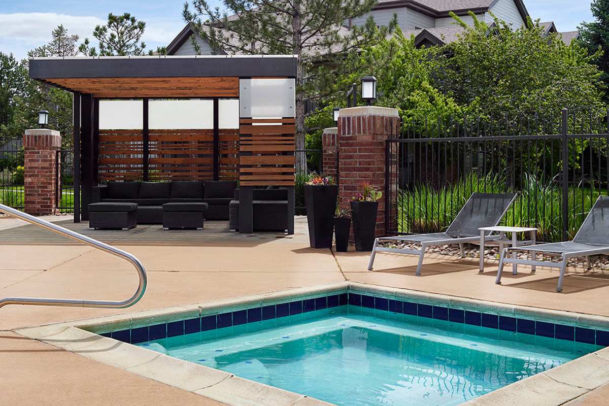Swimming pool with lounge beds at Lafayette Station in Lafayette, Colorado, 