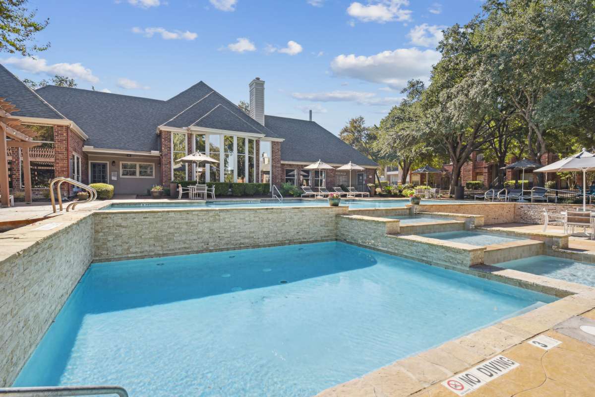 Expansive Swimming Pool With Multiple Levels And A 