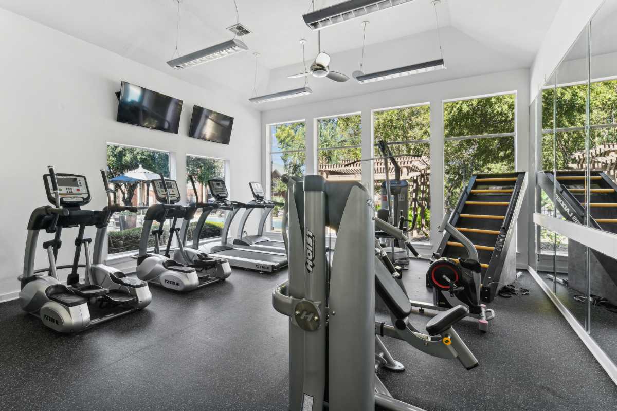 Well-Equipped Fitness Center With Various Exercise Machines at Whispering Creek Villas, San Antonio, Texas