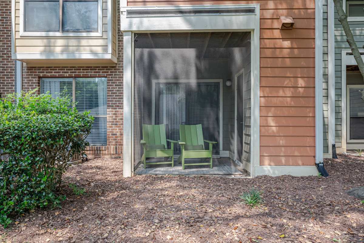 Exterior view of the apartment building at The Retreat at Lake Johnson Apartments, Raleigh, North Carolina