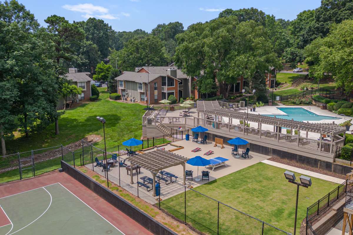 Aerial view of the community with games at The Retreat at Lake Johnson Apartments, Raleigh, North Carolina