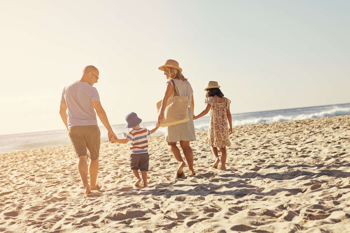A happy family in a beach at Tower24 Ponto Beach in Carlsbad, California